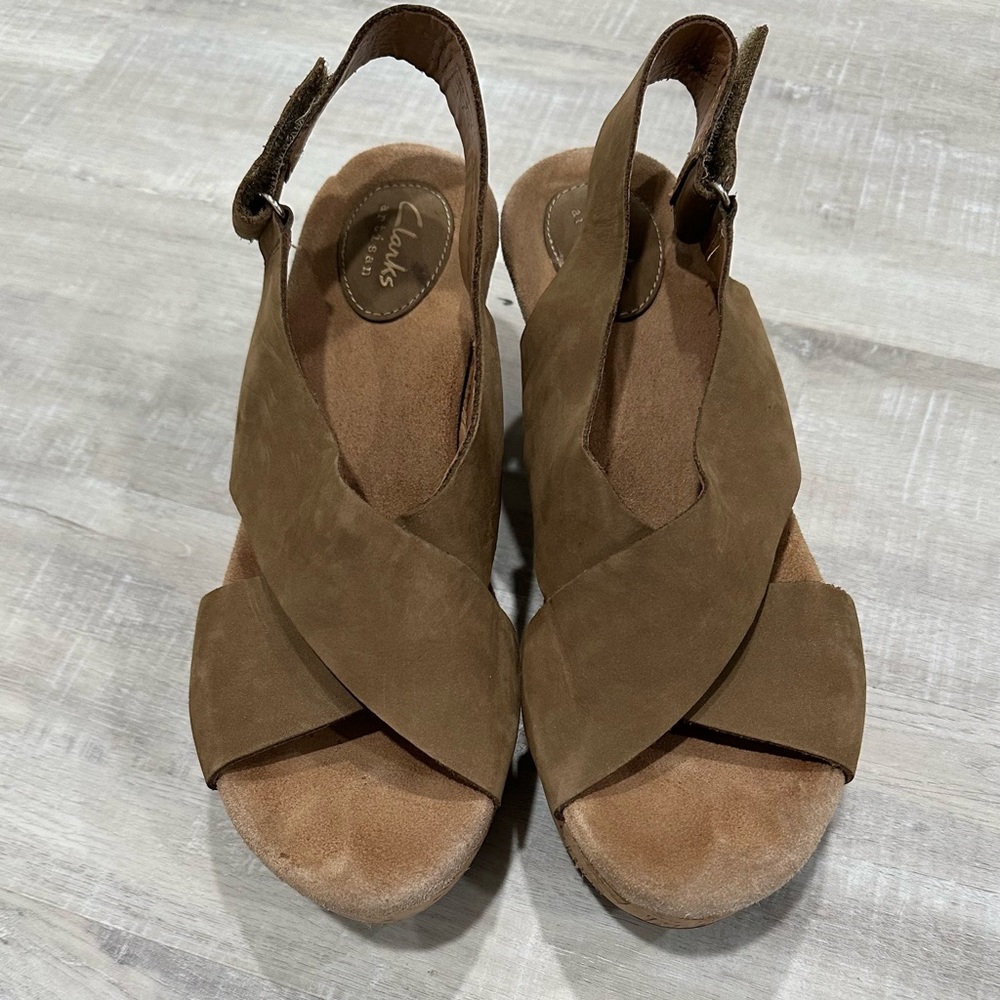 Clark’s wedge sandals. Size 9 but fits more like a 8